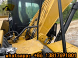 2023 Caterpillar 320 crawler excavator cab and boom detail