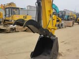 2023 Komatsu PC78US-6 mini excavator bucket and thumb attachment