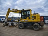 2018 Komatsu PW148-10 wheel excavator, side profile view