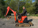 2016 Kubota U10-3 mini excavator side view