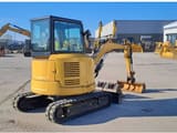 2021 Caterpillar 303.5E crawler excavator, rear three-quarter view