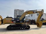 2012 Caterpillar 325DL crawler excavator, side view
