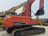 2022 Doosan DX225LC-9C crawler excavator, rear three-quarter view