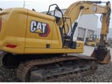 2021 Caterpillar 320-07 crawler excavator, rear three-quarter view