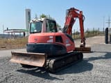 2011 Kubota KX080-3 mini excavator, rear three-quarter view