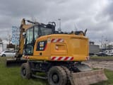 2020 Caterpillar M315F wheel excavator, rear three-quarter view