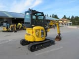 2023 Komatsu PC26 MR-5 mini excavator, three-quarter front view