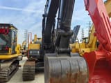 2023 Volvo EC210 crawler excavator front view of bucket and boom