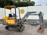 2000 Volvo EB12 mini excavator side view