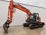2010 Hitachi ZX135US-3 crawler excavator, side view