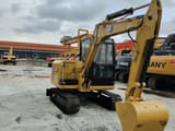 2023 Caterpillar 306E2 mini excavator, three-quarter view