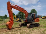 Hitachi Zaxis 120 crawler excavator, side profile view