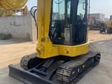 2022 Komatsu PC-55MR mini excavator, front three-quarter view
