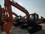 2023 Hitachi ZX130 crawler excavator, side view