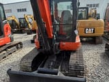 2023 Kubota KX165 mini excavator, front view with blade