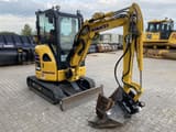 2023 Komatsu PC24MR-5 mini excavator, front three-quarter view