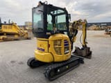 2023 Komatsu PC24MR-5 mini excavator, rear three-quarter view