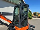 Hitachi ZX26U-6CR mini excavator cab side view