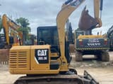 Caterpillar 305.5E mini excavator, side view