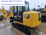 2023 Caterpillar 306E2 mini excavator, rear three-quarter view
