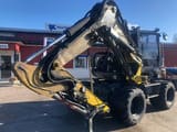 2016 Wacker Neuson EW100 wheel excavator side view