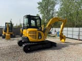 2023 Komatsu PC50MR-3 mini excavator, rear three-quarter view