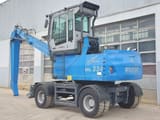 2013 Fuchs MHL 334 D material handler, rear three-quarter view