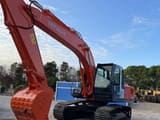 2024 Hitachi ZX200 crawler excavator, front three-quarter view