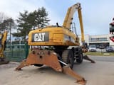 2011 Caterpillar M325D material handler, rear view