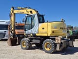 2007 New Holland MH-PLUS wheel excavator, side view