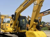 2023 Komatsu PC130-7 crawler excavator, front three-quarter view