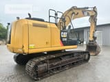2014 Caterpillar 320EL crawler excavator, rear three-quarter view