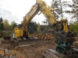 2022 Komatsu PC228USLC-11 crawler excavator, front three-quarter view