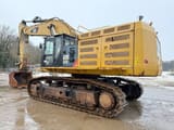 2016 Caterpillar 374F L crawler excavator, rear three-quarter view