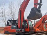 2024 Doosan DX225 crawler excavator, side view