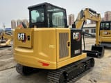 2023 Caterpillar 305.5GC crawler excavator, rear three-quarter view