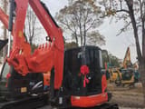 2022 Kubota KX165 mini excavator, front three-quarter view