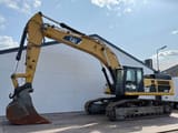2010 Caterpillar 345DL crawler excavator, side profile view
