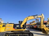 2023 Caterpillar 323DL mini excavator, side view