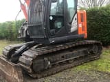 2017 Hitachi ZX135US crawler excavator, side view of cab and tracks