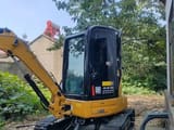 2022 Caterpillar 303.5ECR mini excavator, front three-quarter view