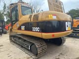 2023 Caterpillar 320CL crawler excavator, rear three-quarter view