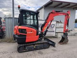 2023 Kubota KX037-4 mini excavator, side view