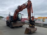 2014 Hitachi ZX140W-5 wheel excavator, front three-quarter view