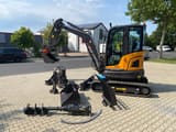 Berger Kraus BK4000KJS mini excavator, side view with attachments