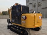 2024 Caterpillar 307E2 mini excavator, rear three-quarter view