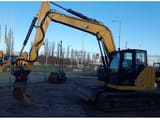 2021 Caterpillar 310-07 crawler excavator side view