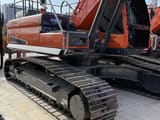 Doosan DX300LC crawler excavator, side view