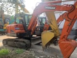2011 Doosan DX60-9C mini excavator, side view