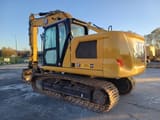2023 Caterpillar 317 GC crawler excavator, rear three-quarter view